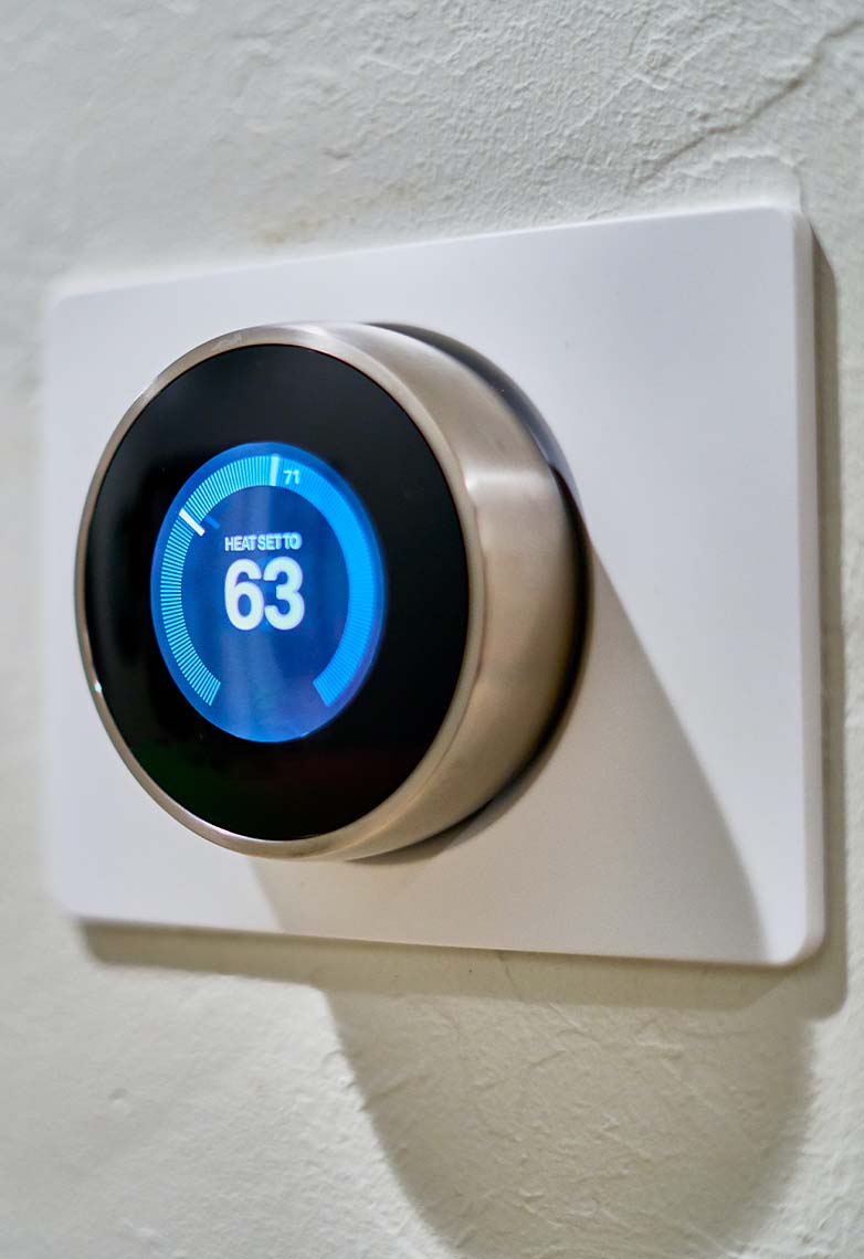 Smart control thermometer on wall Smart control thermometer on wall