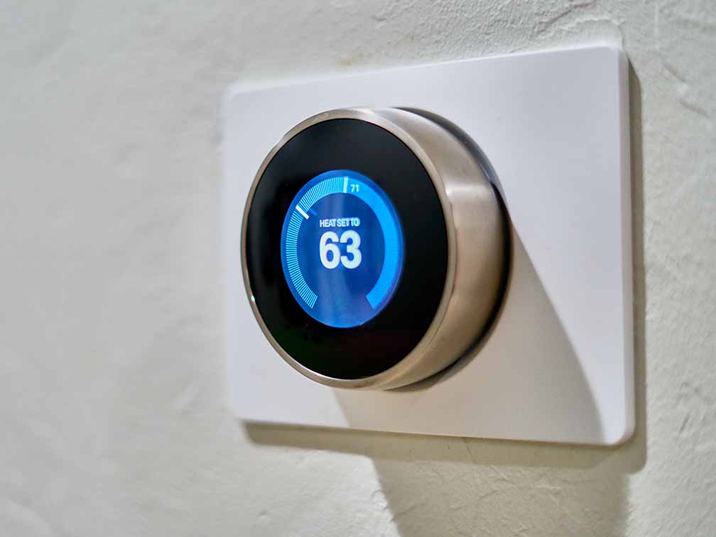 Smart control thermometer on wall Smart control thermometer on wall